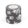 Roll of gray and white fruit pattern elastic bandage tape for joints
