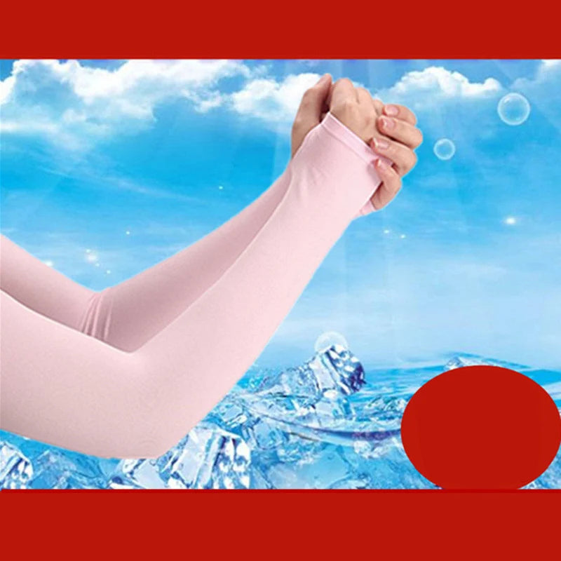 Pink ice silk arm sleeves being held against a bright blue sky with clouds and icy landscape.