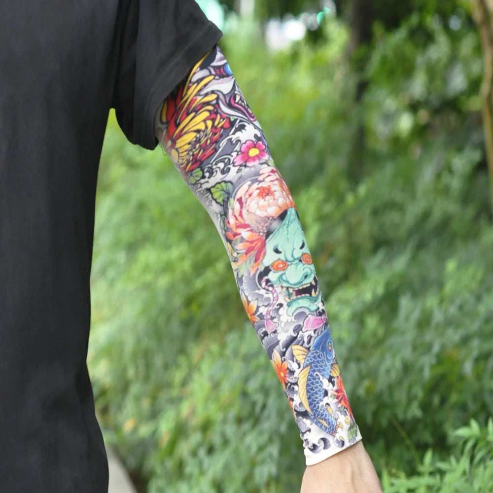 Close-up of a person wearing colorful, floral-patterned ice silk tattoo sleeves on their arm.