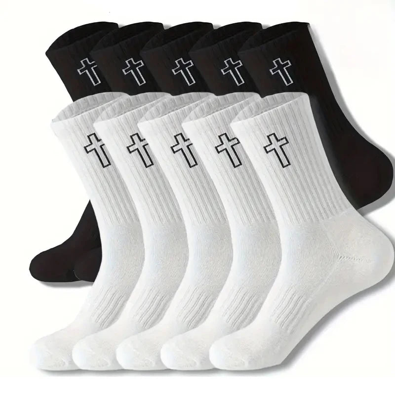 A set of black and white men's high-cut breathable casual crew socks laid out for display.