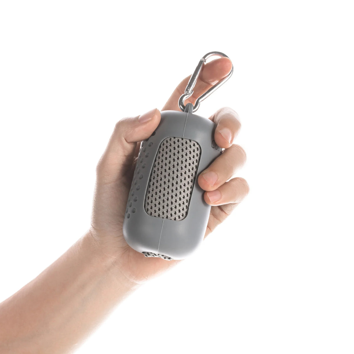 A hand holds a gray instant cooling towel for sports and fitness, featuring a mesh surface and an attached metal clip.