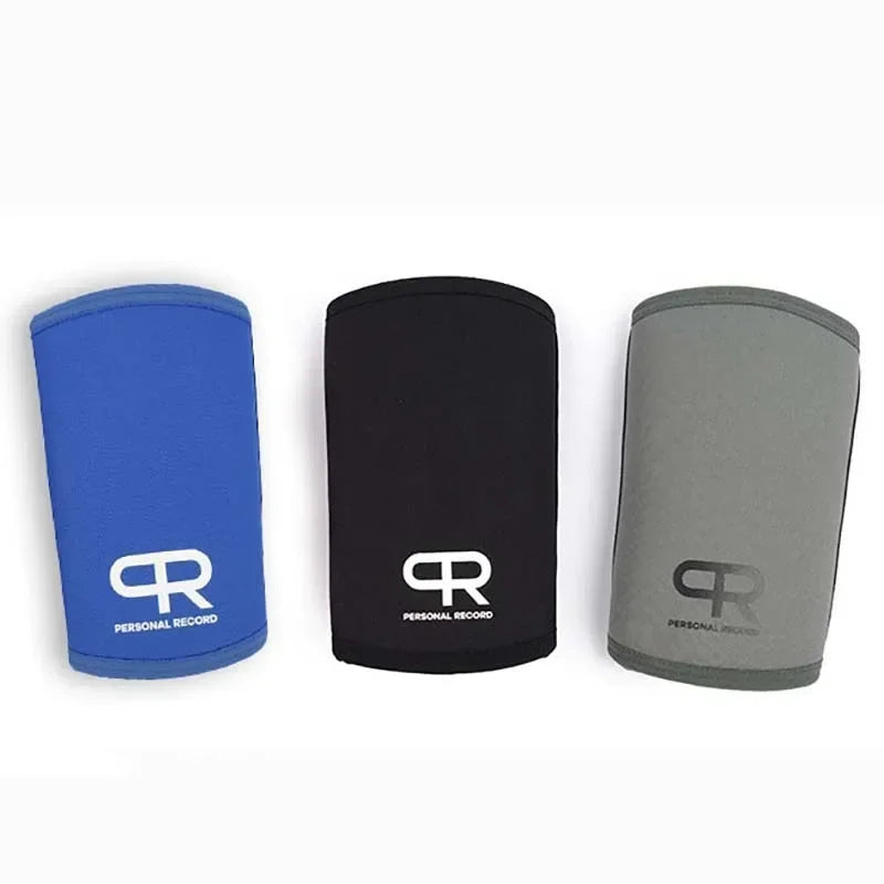 Three neoprene knee pads in blue, black, and gray for lifting and fitness