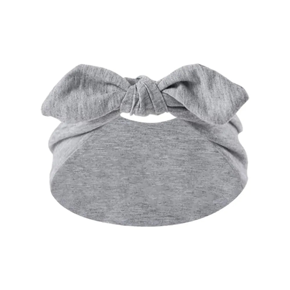 Gray bohemian bunny ear headband with a bow detail