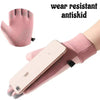 Pink anti-skid wrist gloves worn on a hand, with a smartphone visible.