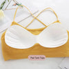 Yellow pad tank top sports bra with white padded cups and thin straps
