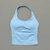 Light blue seamless performance yoga and gym tank top shown flat lay