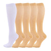 A row of medical grade compression socks in various shades of beige and white.