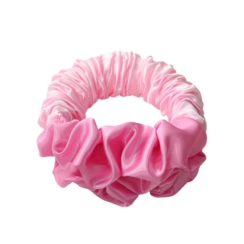Pink satin heatless curling rod headband with ruffled fabric