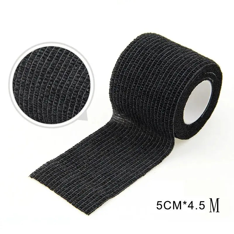 Black disposable anti-slip tattoo bandages in a roll and flat strip