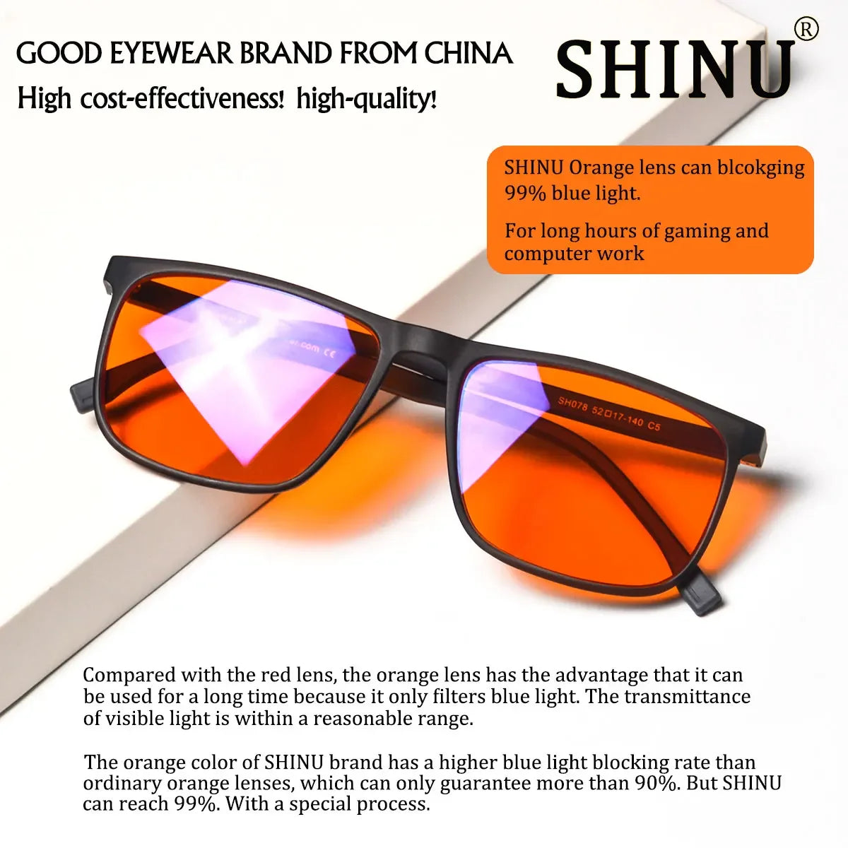 Orange lens blue light blocking glasses shown on a wooden surface