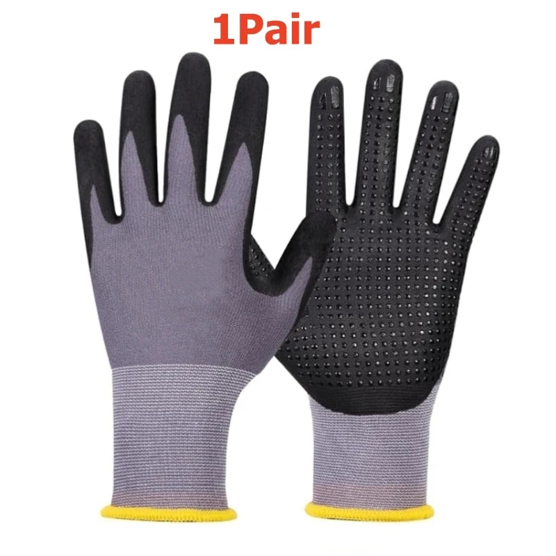 A pair of black and gray durable nitrile coated safety work gloves for mechanics and gardening.