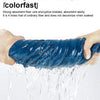 A hand is holding a blue absorbent fiber cleaning towel while water flows over it.
