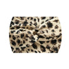 Bandeau de sport à imprimé léopard beige et noir, élastique, noué en nœud.