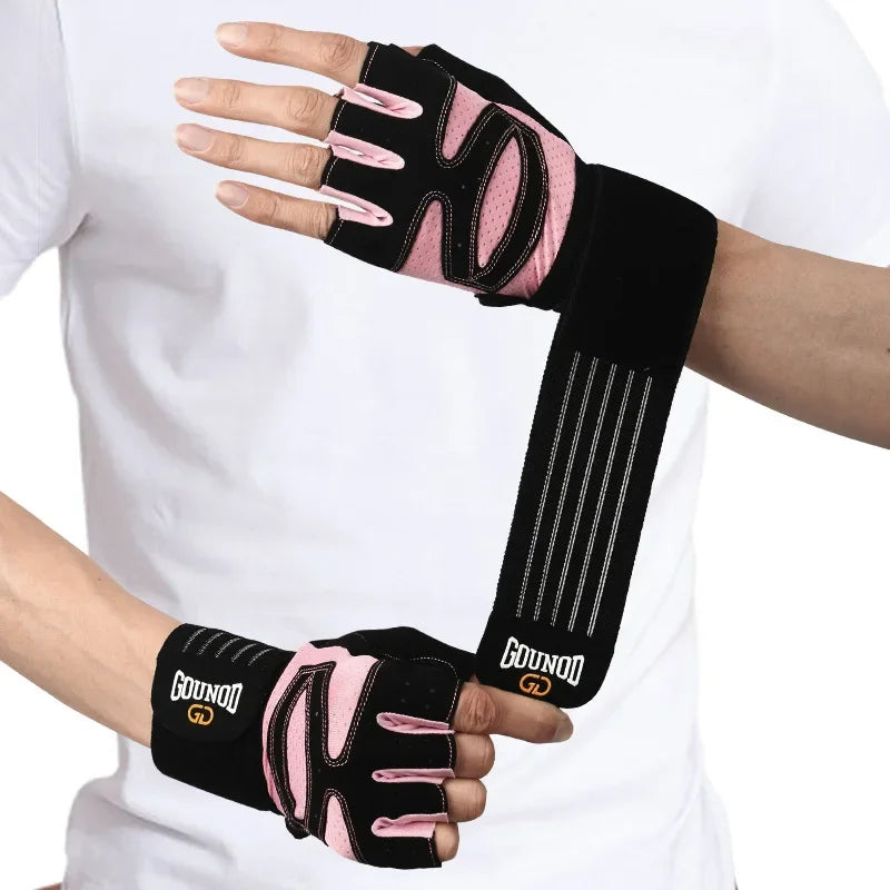A hand wearing black and pink anti-slip weightlifting gloves with textured grips on a white shirt.
