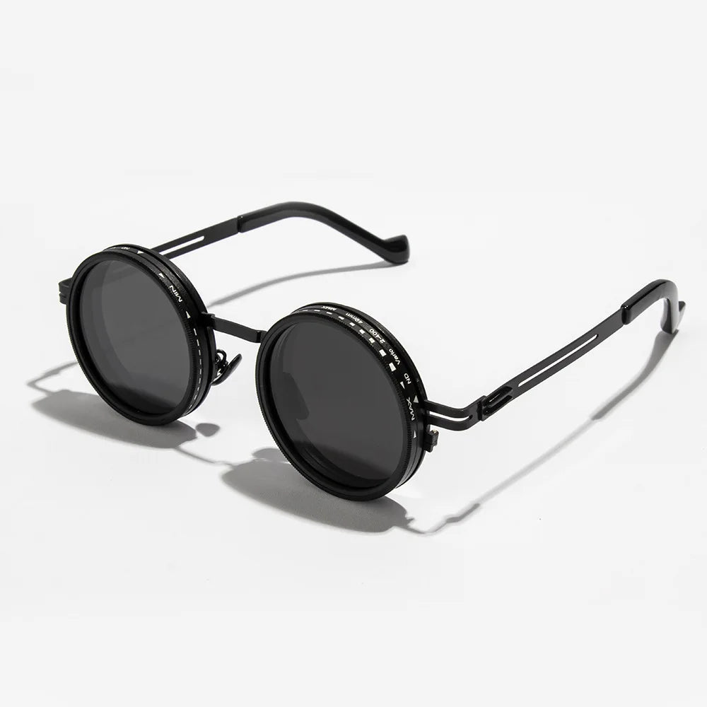 A pair of black polarized round sunglasses with adjustable dimming features.
