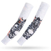 Pair of white arm sleeves featuring a skull and crossbones design for sun and heat protection