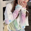 A woman models white and pastel colored floral ice silk sun protection arm sleeves