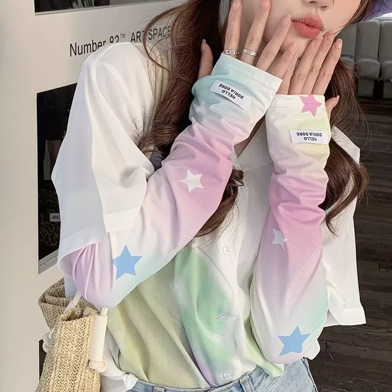 A woman models white and pastel colored floral ice silk sun protection arm sleeves