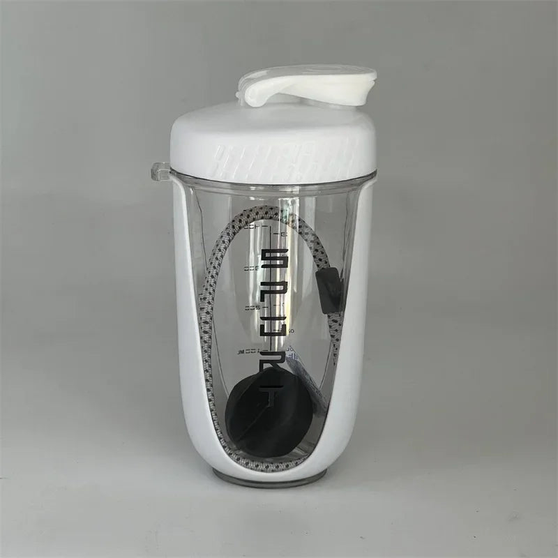 A white 600ml blender shaker bottle with a clear body and a white lid is shown against a gray background.