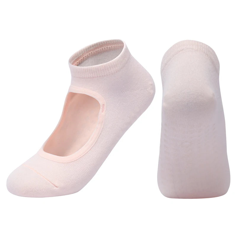 A pair of light pink breathable women's Pilates and yoga socks shown from the side.