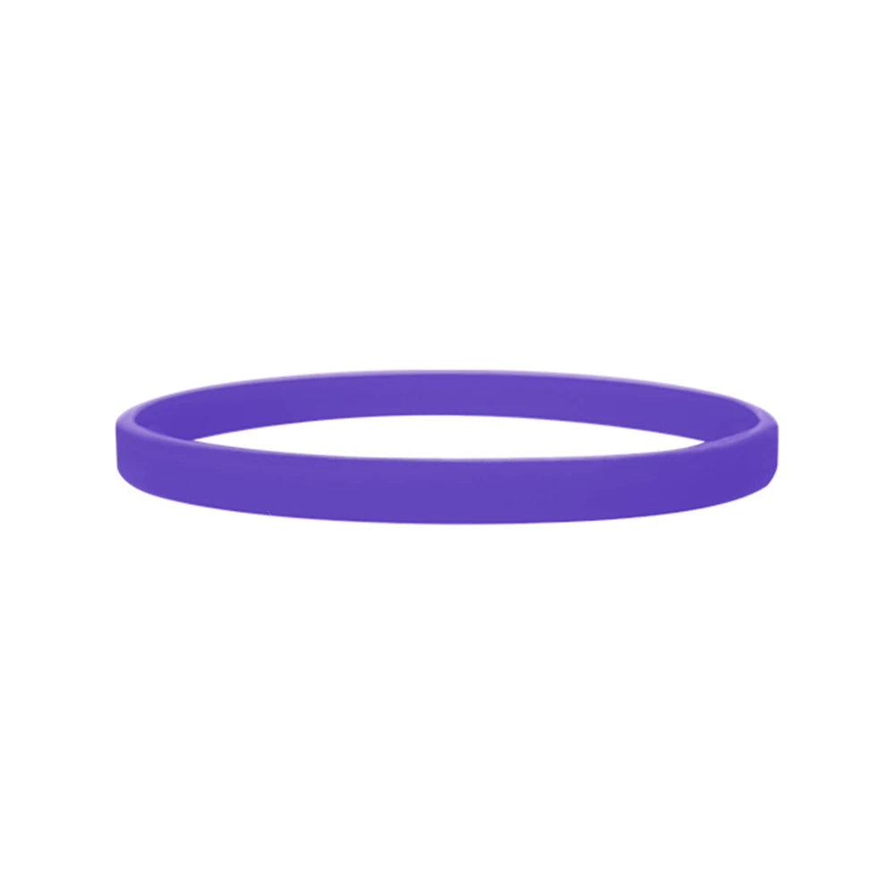 A purple silicone wristband shown lying flat.