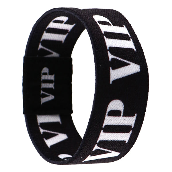 Black and white striped acrylic elastic rope bracelet with a square clasp.