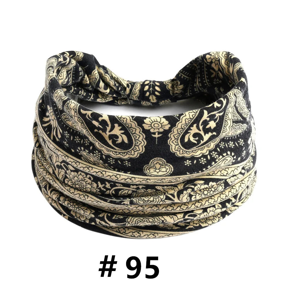 Black and gold boho print cotton headbands rolled into a thick, textured band.