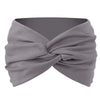 A gray twisted criss cross elastic headband is shown folded and wrapped around a head.