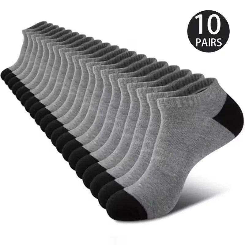 Ten pairs of gray and black comfort fit ankle socks displayed in a row.