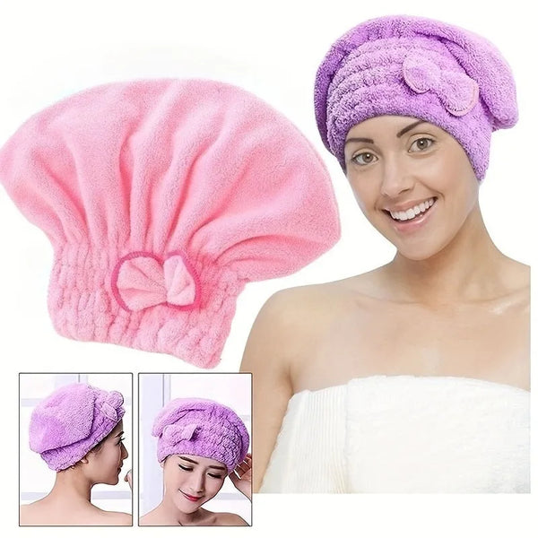 A woman models a purple hair drying towel cap, showing its texture and fit.