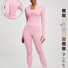Model trägt ein pinkes Damen-Yoga-Sportset mit langärmeligem Oberteil und Leggings.