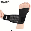 Black adjustable wrist support brace for fitness shown on a hand and wrist.