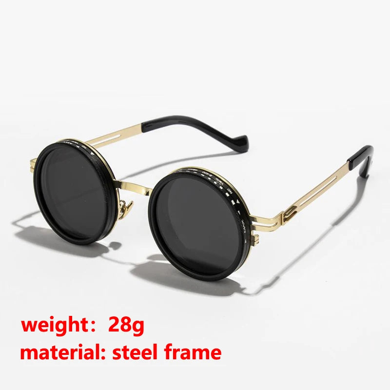 Black round sunglasses with gold and black accents shown against a white background