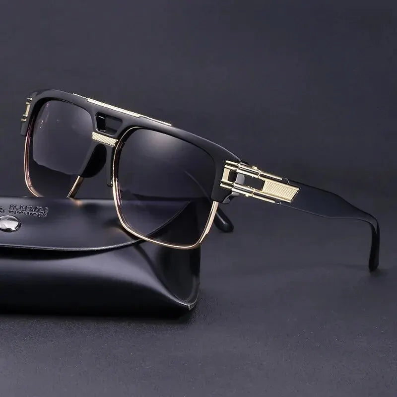 A pair of classic retro square sunglasses with gold accents resting on a black leather case.