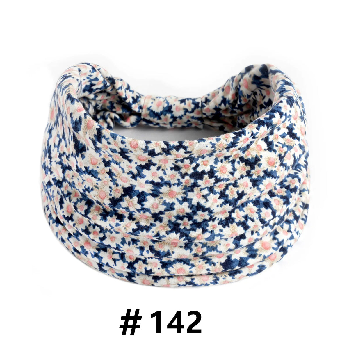 Tire-visible élastique en coton à motifs floraux, enroulé en turban.