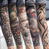 A row of people wearing black and gray reusable UV protection tattoo arm sleeves