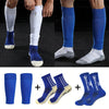 A set of men's grip soccer socks and knee pads shown on a foot and leg.