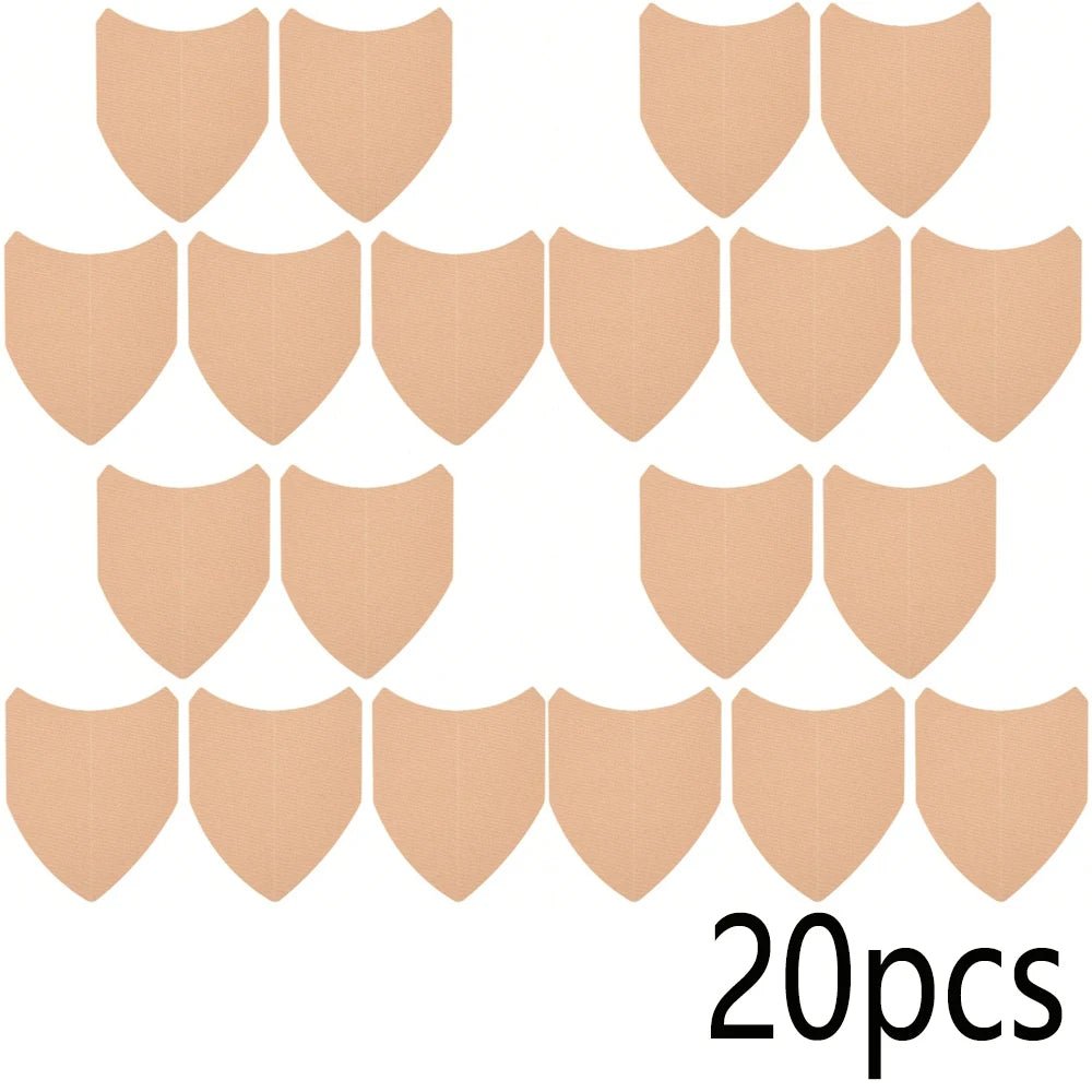 Collection de vingt bandes anti-frottement en forme de bouclier beige, disposées en deux rangées.