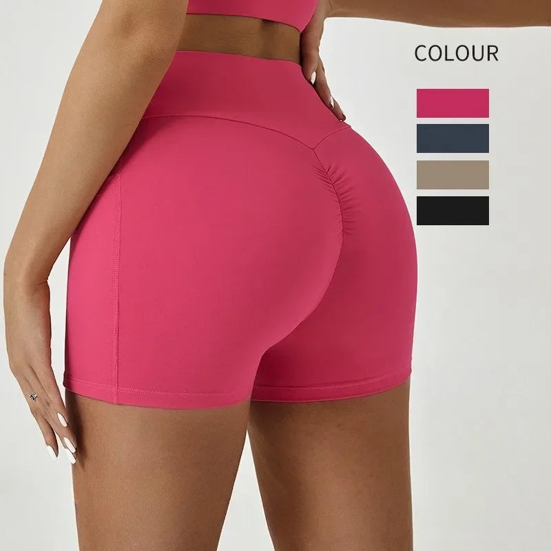 A model wearing bright pink high-waisted yoga and fitness leggings with a color palette selection.