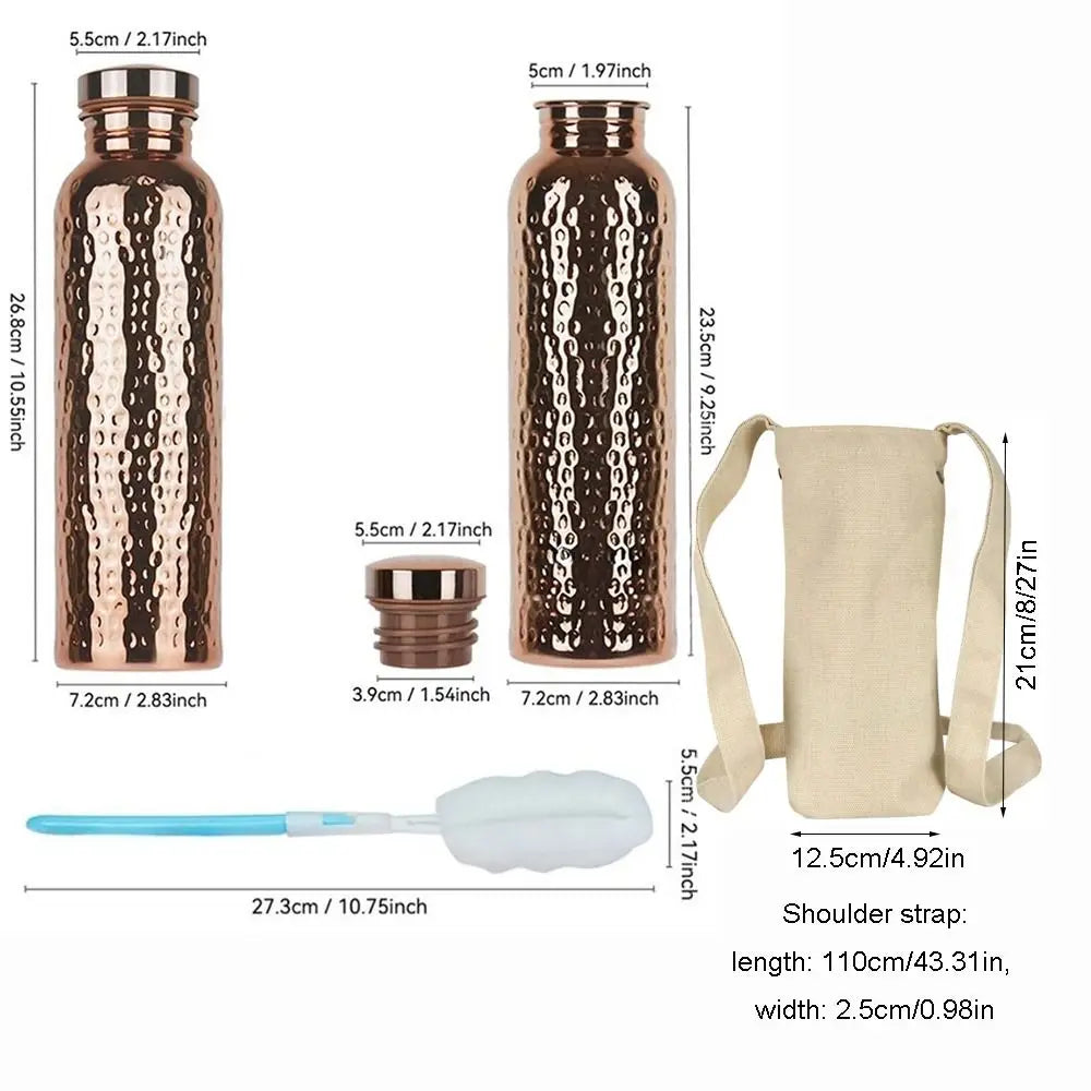 A brown copper insulated water bottle with a textured pattern and a silicone anti-slip grip and shoulder strap.