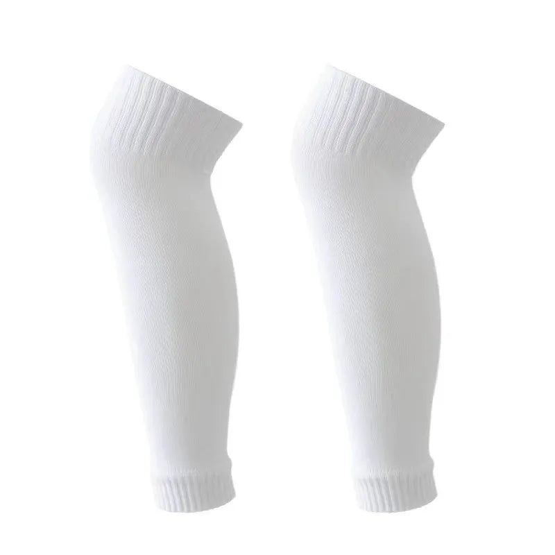 A pair of white compression football socks displayed against a white background.