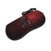 A dark red pouch with a black spider web design and a black strap.