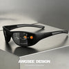 Black polarized sports sunglasses resting on a gray surface.