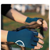 A hand wearing a dark blue half-finger cycling glove gripping a bicycle handlebar.