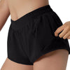 Black women's high-waisted running shorts worn by a model.
