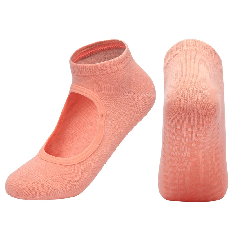 A pair of peach-colored breathable women's Pilates and yoga socks shown from the side.