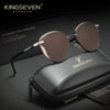 نظارات شمسية بنية اللون ملقاة على علبة جلدية سوداء تحمل شعار ماركة Kingseven.