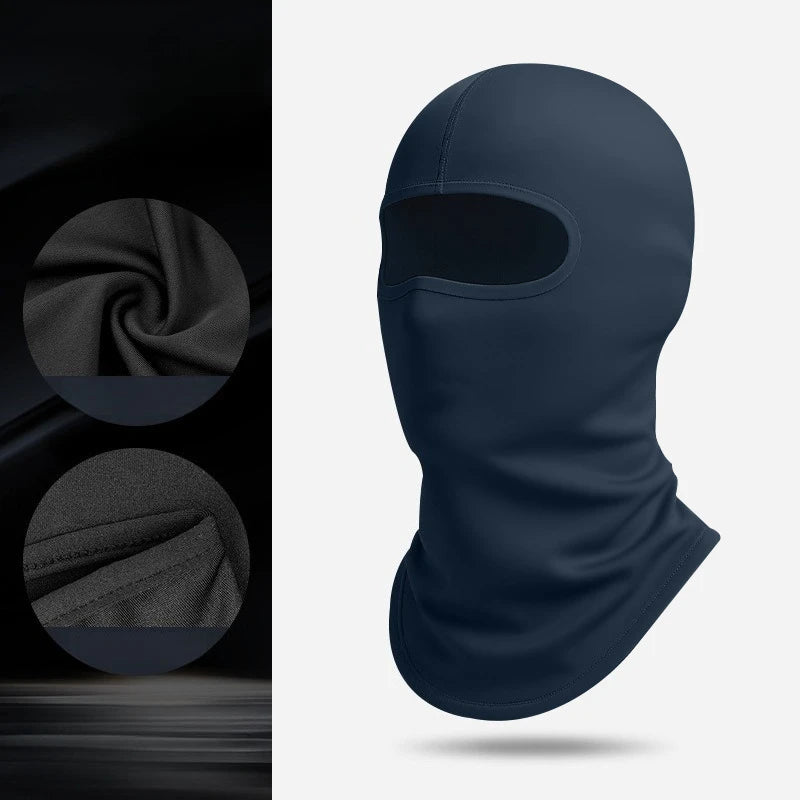A dark blue thermal balaclava and head covering shown in a full-face, close-up view.