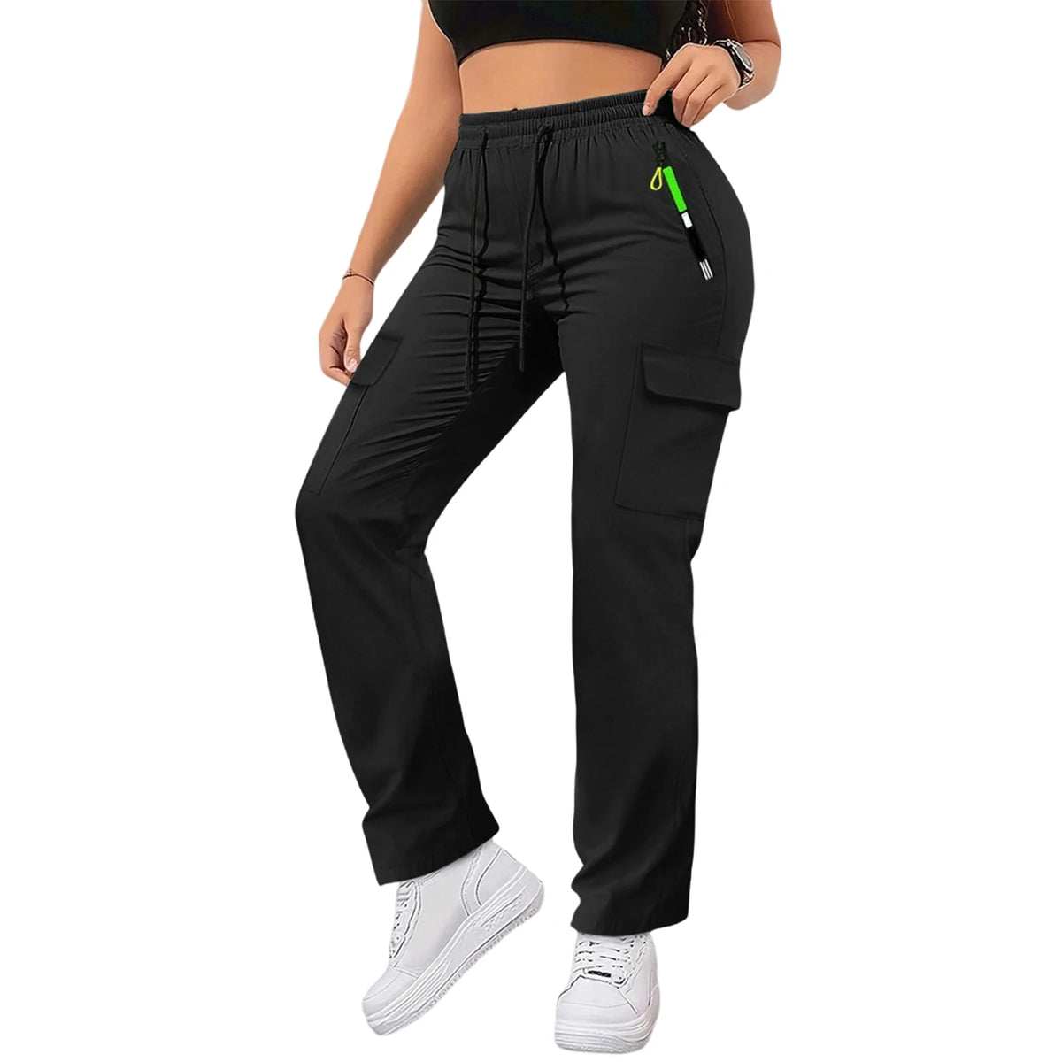 Black women's straight fit drawstring cargo pants with a pocket detail and white sneakers