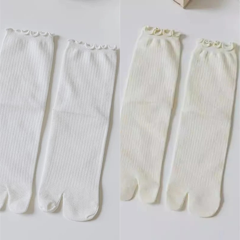 Pair of white knit crew socks with ruffle cuffs shown in a split image.